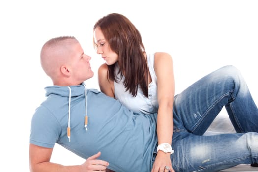 Young adults in a white studio having fun
