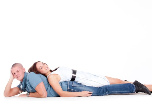 Young adults in a white studio having fun