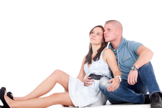 Young adults in a white studio having fun