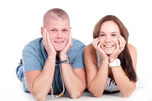 Young adults in a white studio having fun
