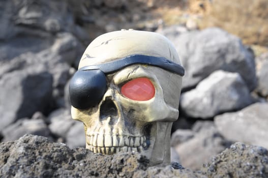 One Pirate Skull with Red Eye and a Patch