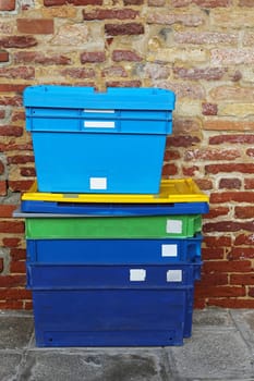 Pile of plastic shipping boxes for delivery