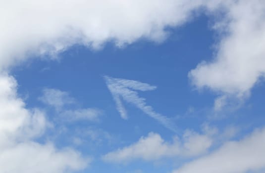Cloud arrow going upward in the sky among the clouds