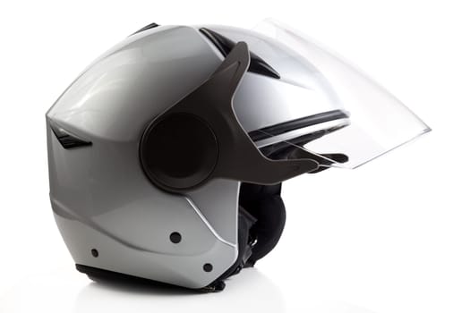 Gray open face motorcycle helmet isolated on white