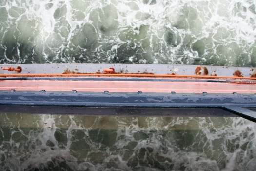Water reflections on board of Staten Island Ferry