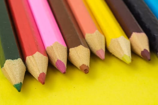 New Pencils Textured Set on a Colored Background