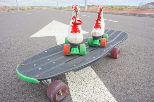 Hdr Picture of Old Vintage White Skate Boot on the Asphalt Sterret