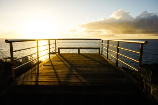 Sunrise on a Pier over Atlantic Ocean in Tenerife Canary Islands Spain