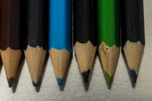 New Pencils Textured Set on a Colored Background