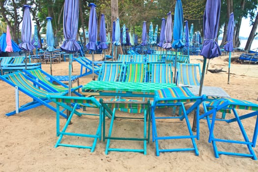 Beach chairs on tropical white sand beach,thailand