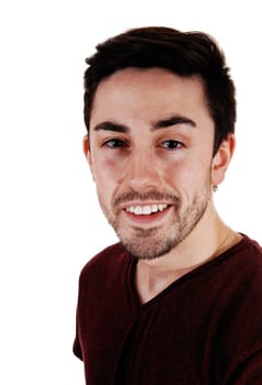 A young man standing for white background very relaxed .in a portrait picture with a beard..
