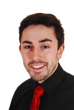 A closeup picture of a young man in a black shirt with red tie smiling into.the camera with a beard, for white background..