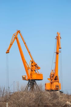 River port dock obsolate industrial yellow cranes
