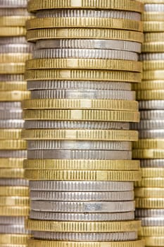 Money background. Close-up view of coins stacks