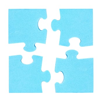 Four  puzzle pieces combined cooperation concept. Isolated on white background