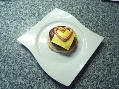 Hamburgers with a heart made of mayonnaise