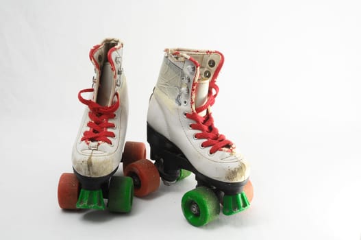 Used Vintage Consumed Roller Skate on a White Background