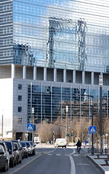 Frankfurt,Germany - February 19,2014: The modern façade with reflections in Frankfurt's city center with traffic on February 19,2014 in Frankfurt.