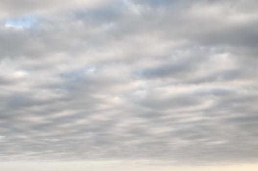 Cloudscape, Colored Clouds at Sunset near the Ocean