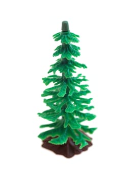 Toy fir trees isolated against a white background
