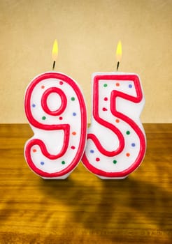 Burning birthday candles number 95