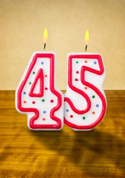 Burning birthday candles number 45