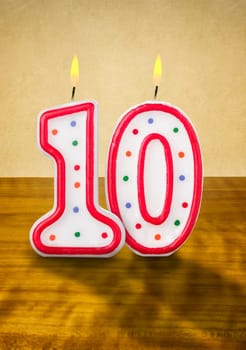 Burning birthday candles number 10