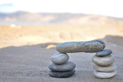 A stack of pebbles in black and white, arch shape, zen concept