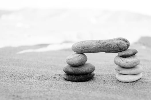 A stack of pebbles in black and white, arch shape, zen concept