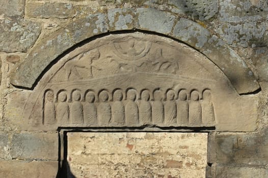 Romanesque tympanum at the church ruins in Alt-Rhoden