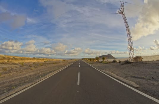 Long Empty Desert Road on a Cludy Day