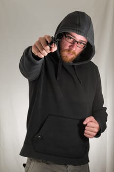 Black Dressed Young Man Holding a Pistol Gun