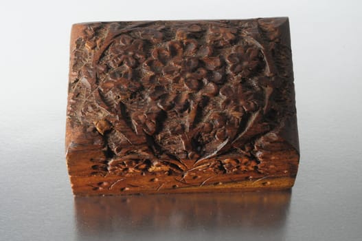 Handmade Ancient Vintage Wood Box on a Silver Background