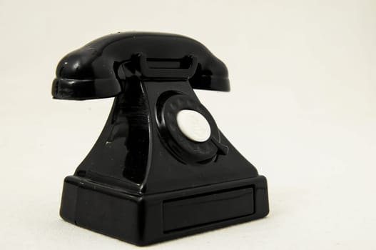 Vintage Old Telephone Plastic Black Toy on a White Background