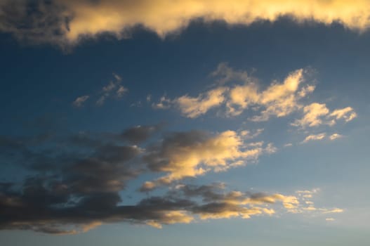 Cloudscape, Colored Clouds at Sunset near the Ocean