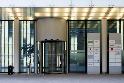 Frankfurt,Germany – February 19,2014: The entrance of an office building with a revolving door on February 19,2014 in Frankfurt.
