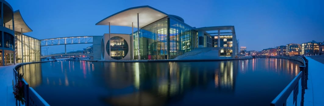 Panoramic view of the Marie-Elisabeth-Lueders-Haus in the government district of Berlin at dusk