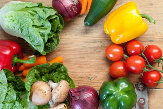 Vegetables on wooden board round