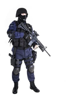 Special weapons and tactics (SWAT) team officer with his gun