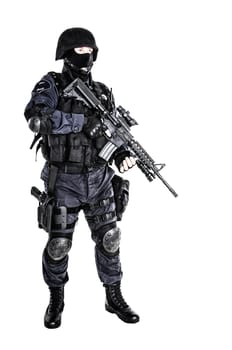 Special weapons and tactics (SWAT) team officer with his gun