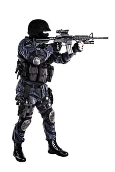 Special weapons and tactics (SWAT) team officer with his gun