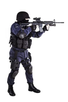 Special weapons and tactics (SWAT) team officer with his gun