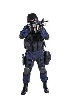 Special weapons and tactics (SWAT) team officer with his gun