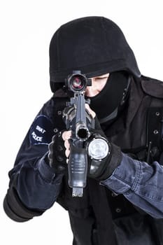 Special weapons and tactics (SWAT) team officer with his gun
