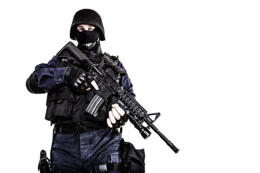 Special weapons and tactics (SWAT) team officer with his gun