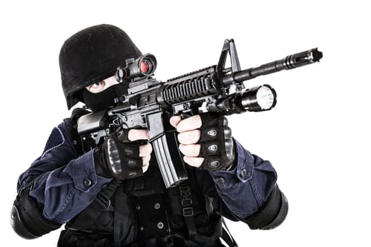 Special weapons and tactics (SWAT) team officer with his gun