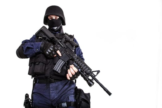 Special weapons and tactics (SWAT) team officer with his gun