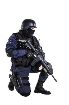 Special weapons and tactics (SWAT) team officer with his gun