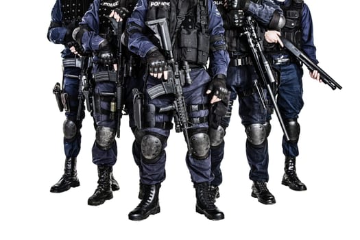 Special weapons and tactics (SWAT) team officers with guns