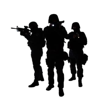 Silhouettes of special weapons and tactics (SWAT) team in action